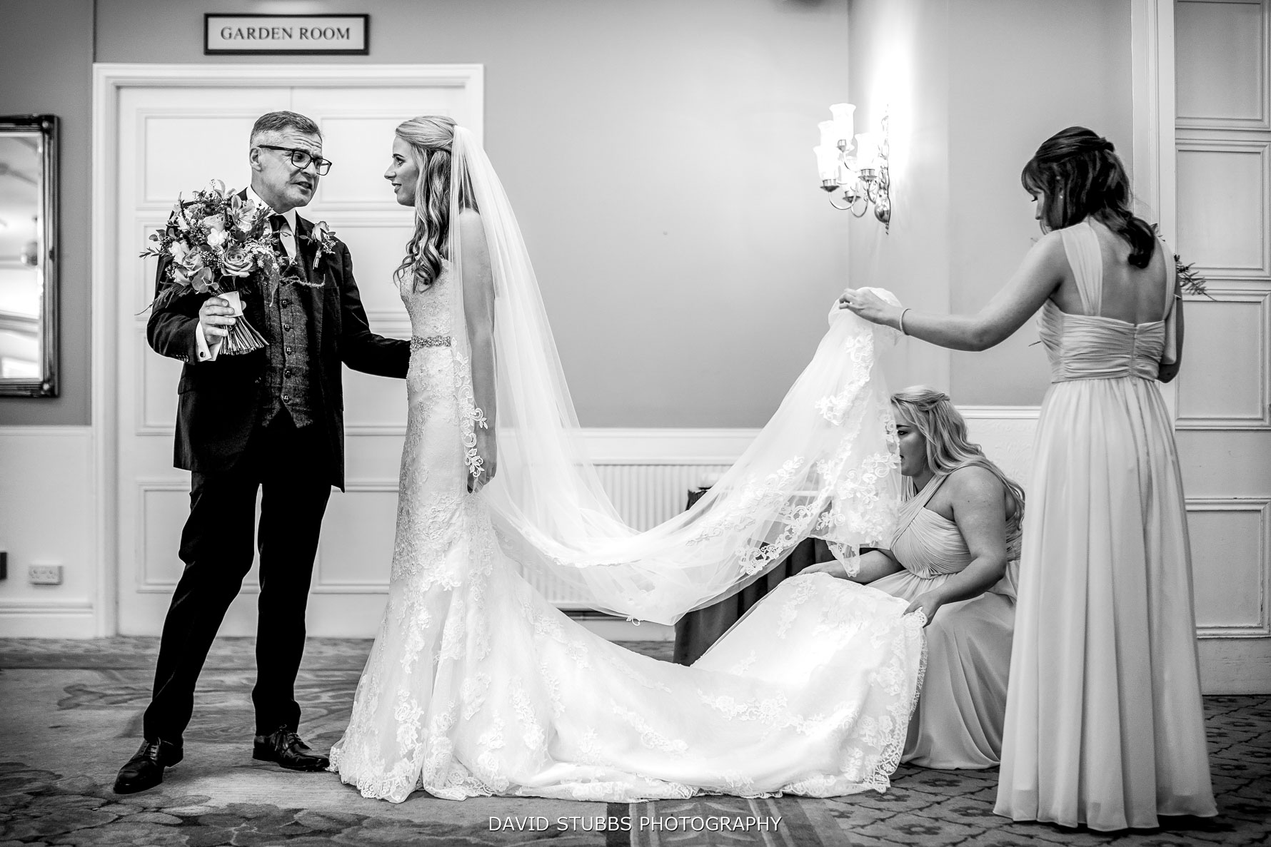 final touches to the dress in the suit