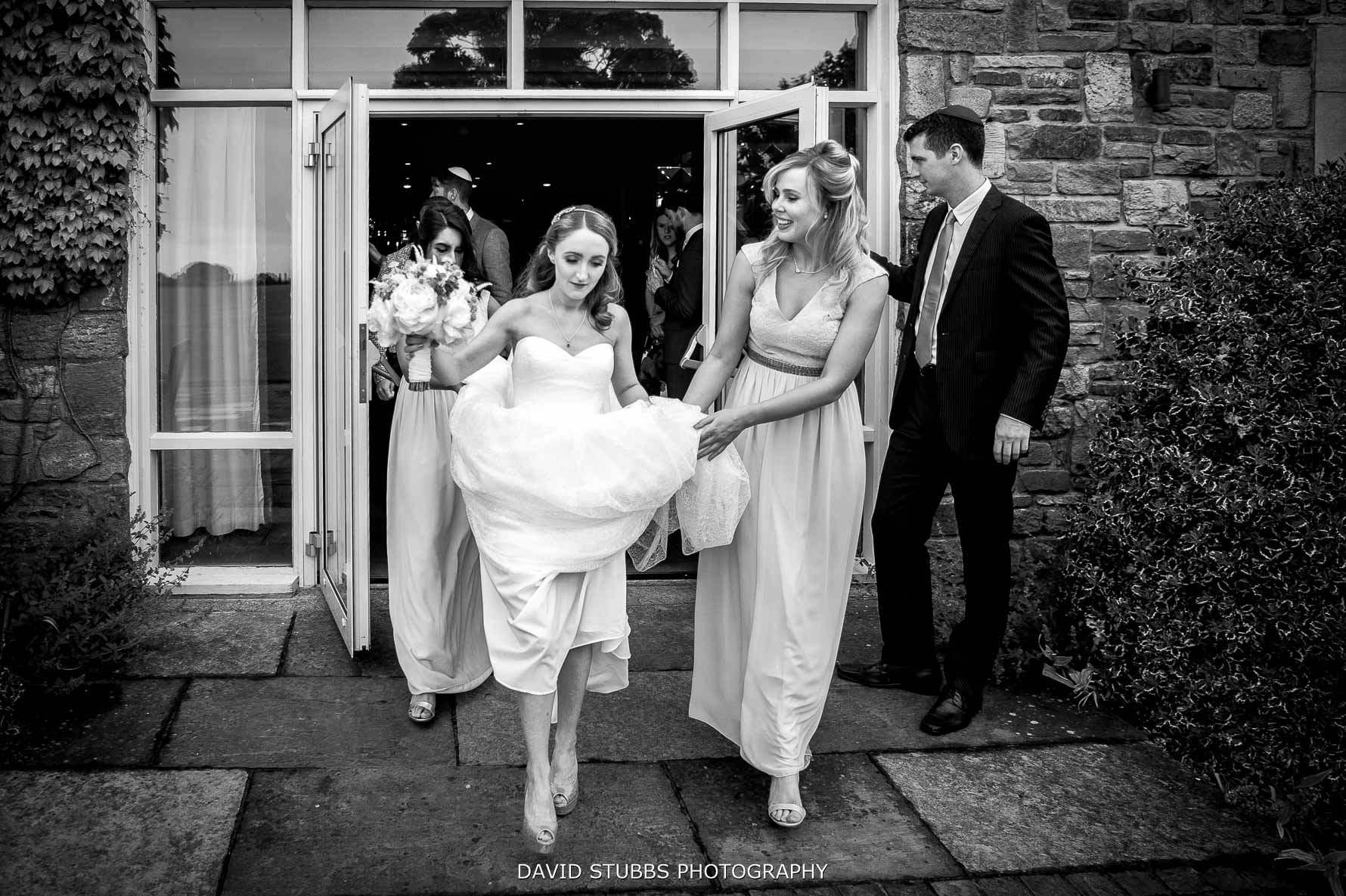 bride walking out showing dress