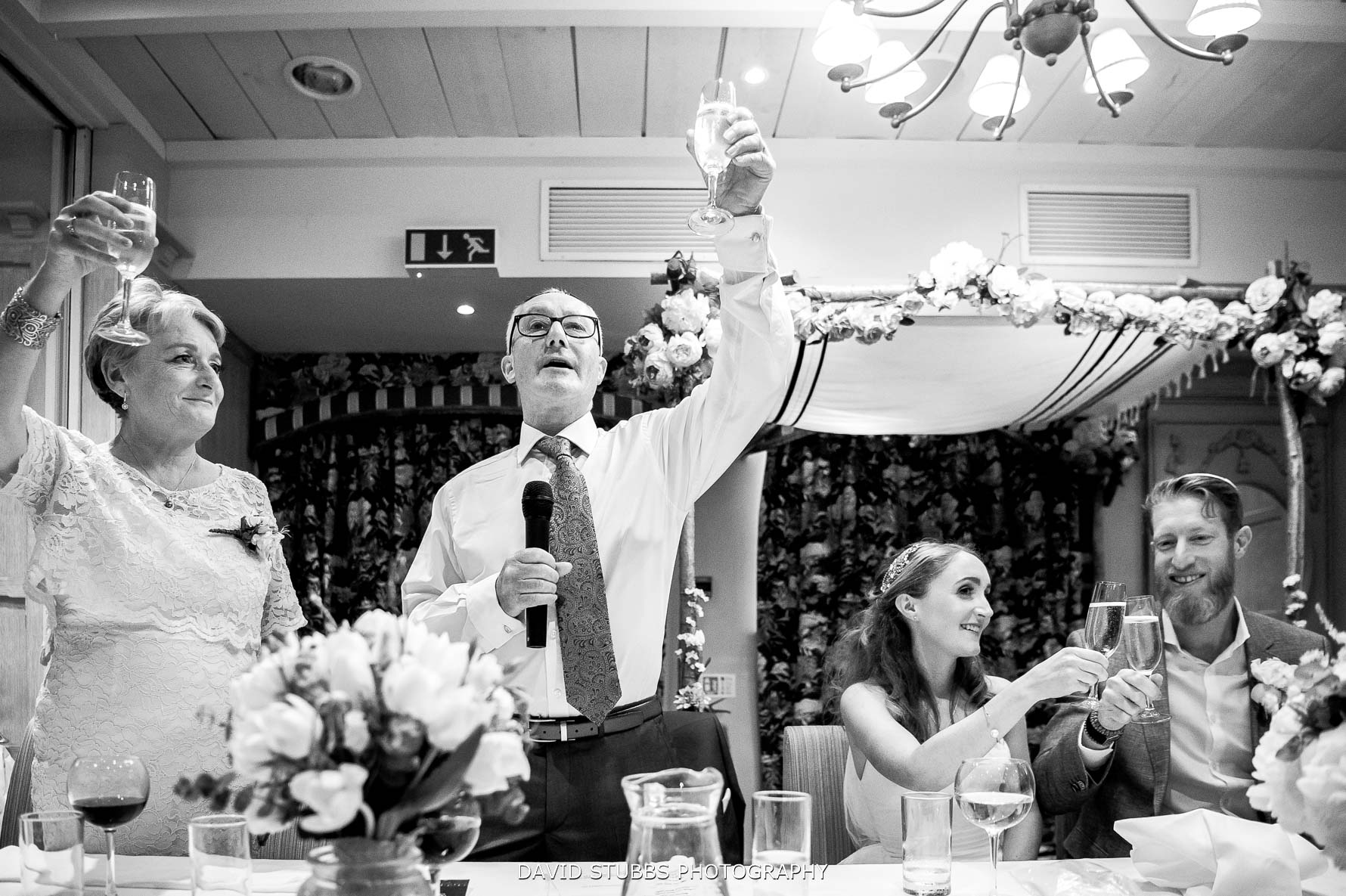 celebrating the wedding during the speeches
