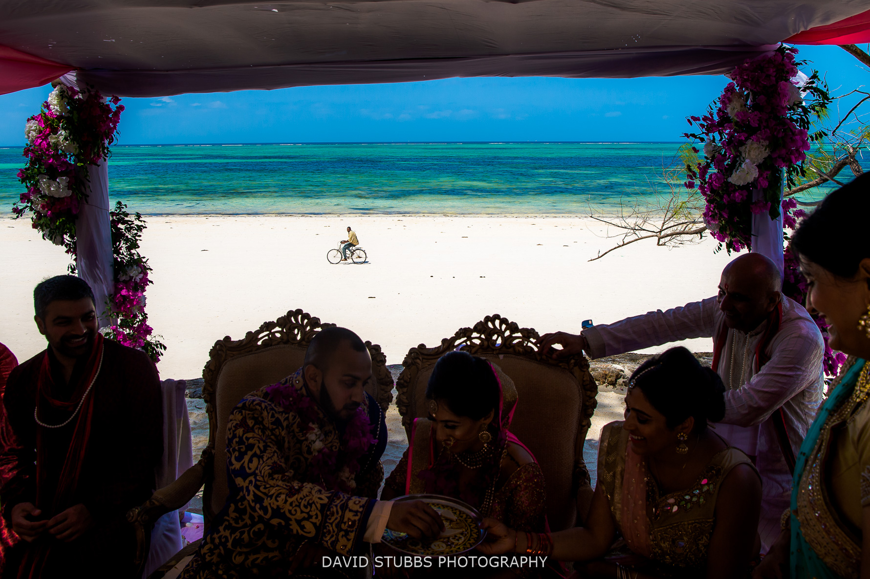 riding bike on zanzibar beach
