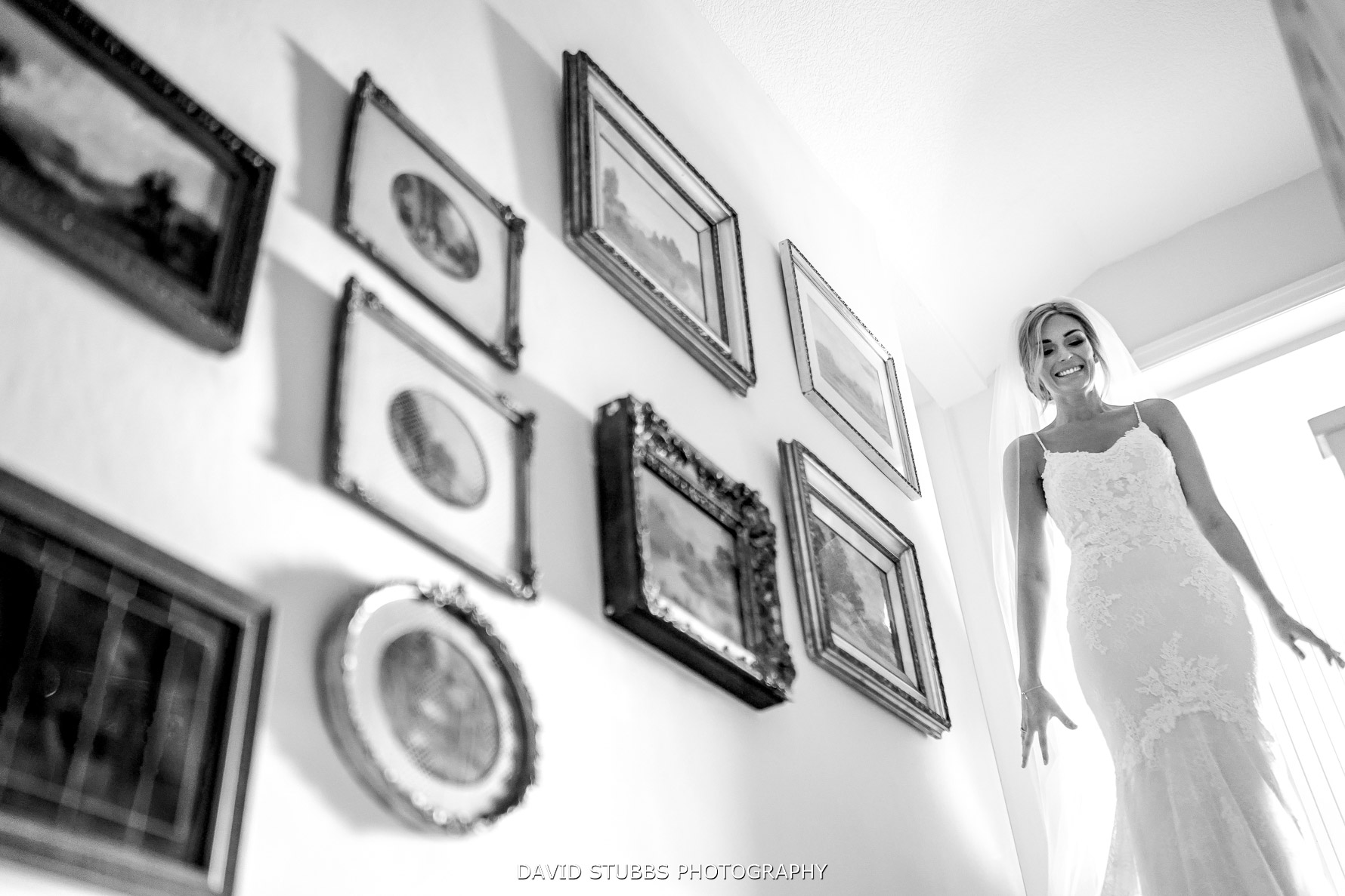 high angle up the stairs with photos framed in the composition