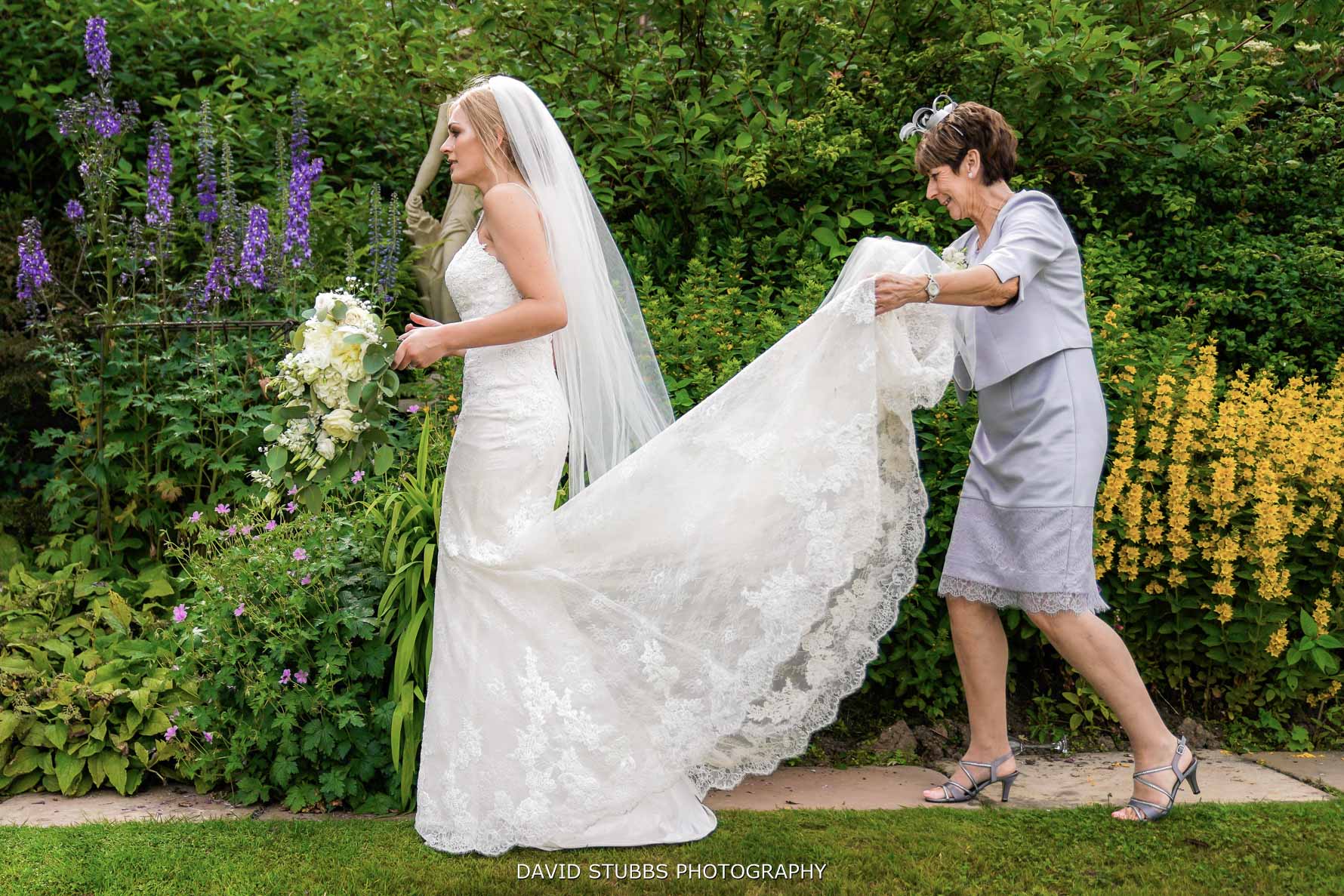 carrying the wedding dress