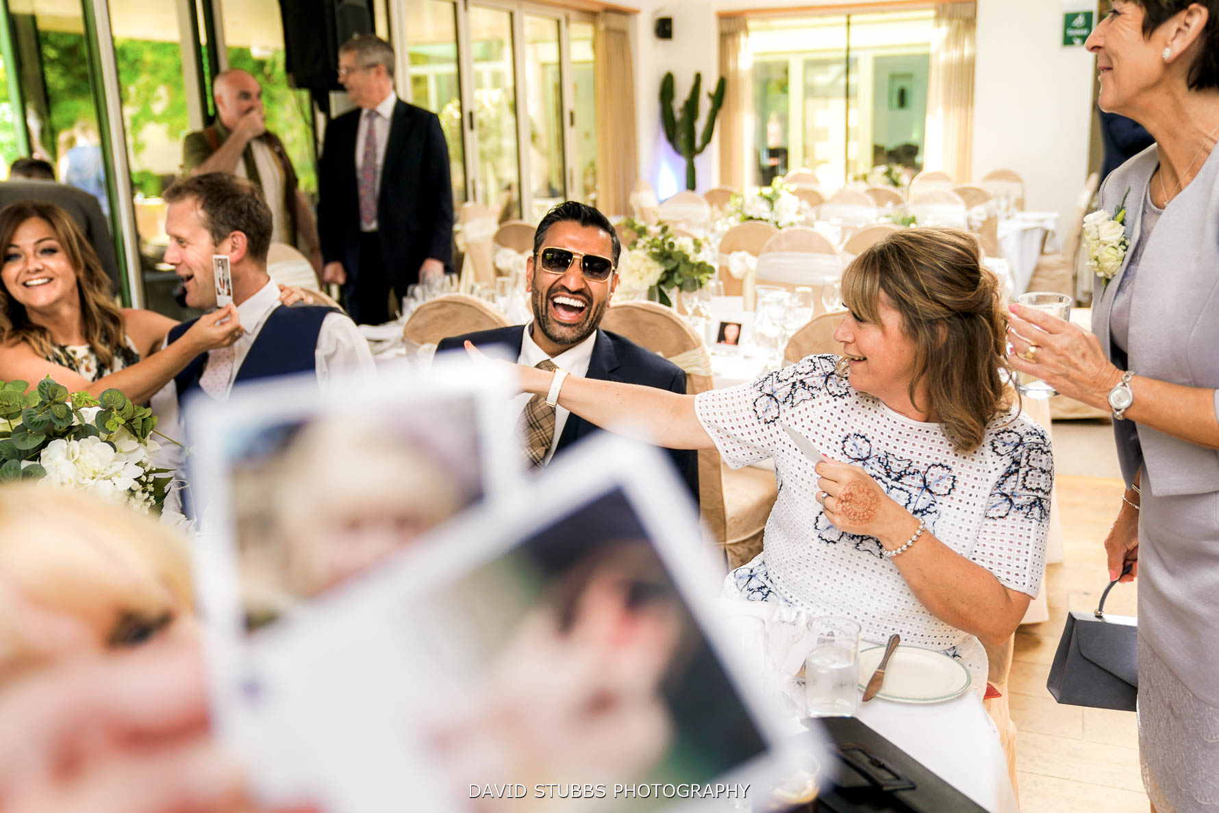 reaction to polaroid potos on tables