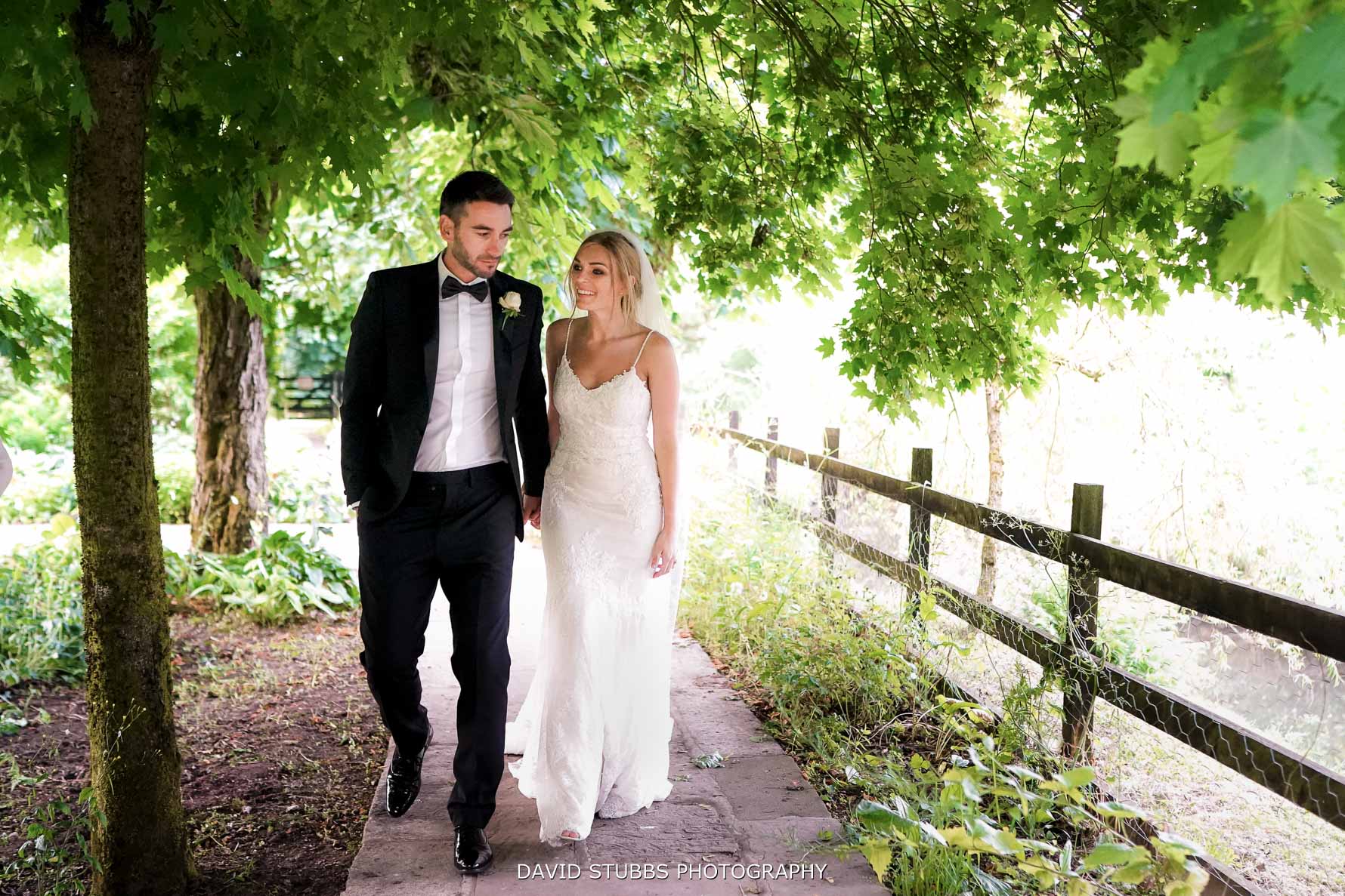 bride and groom walking naturally together