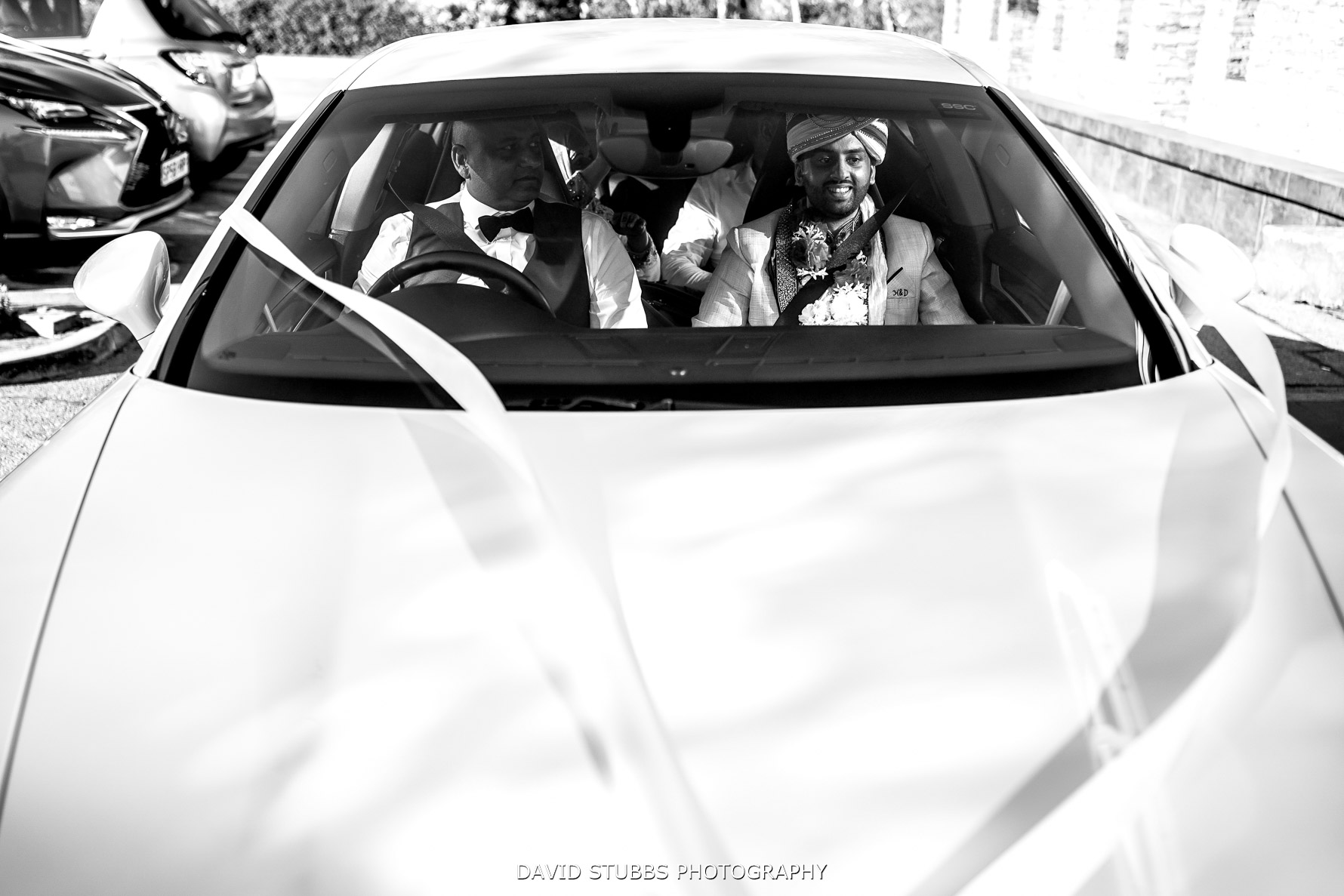 groom arriving in the wedding car