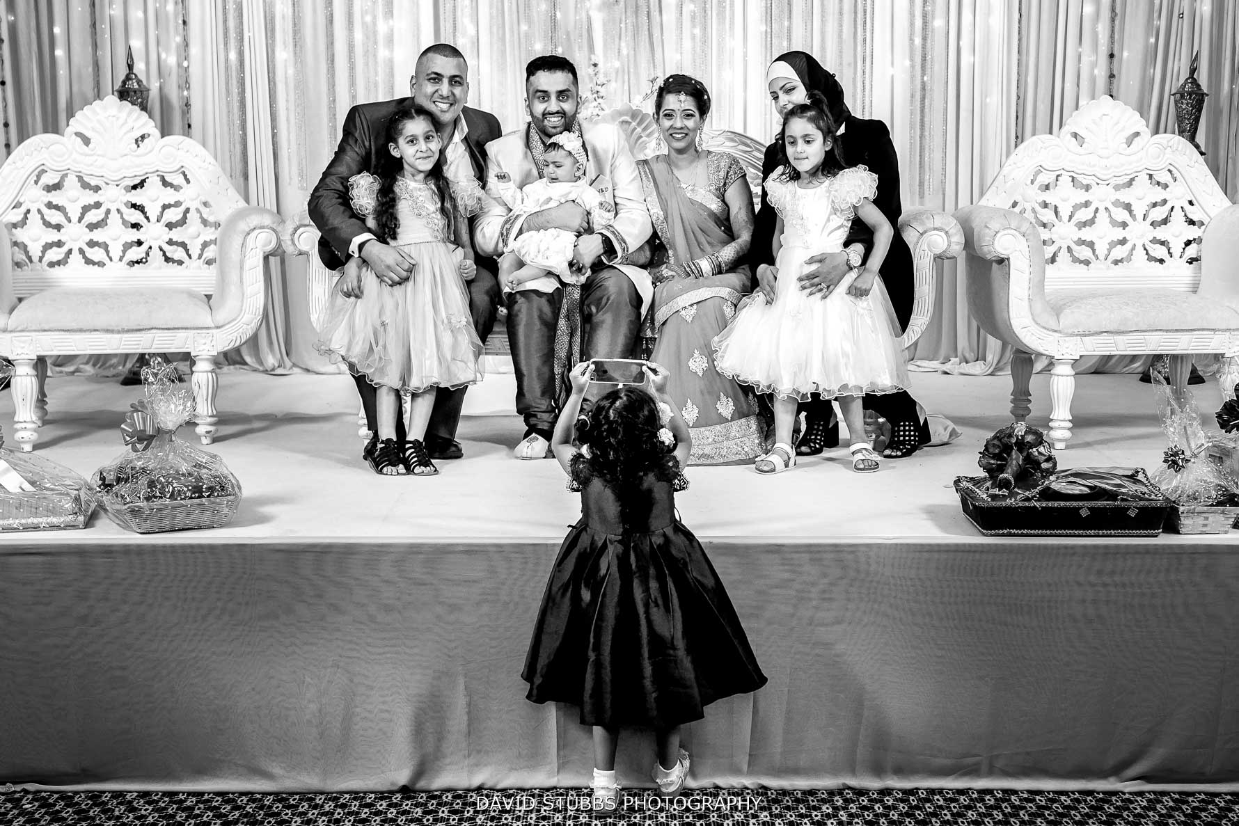 little girl taking a photo