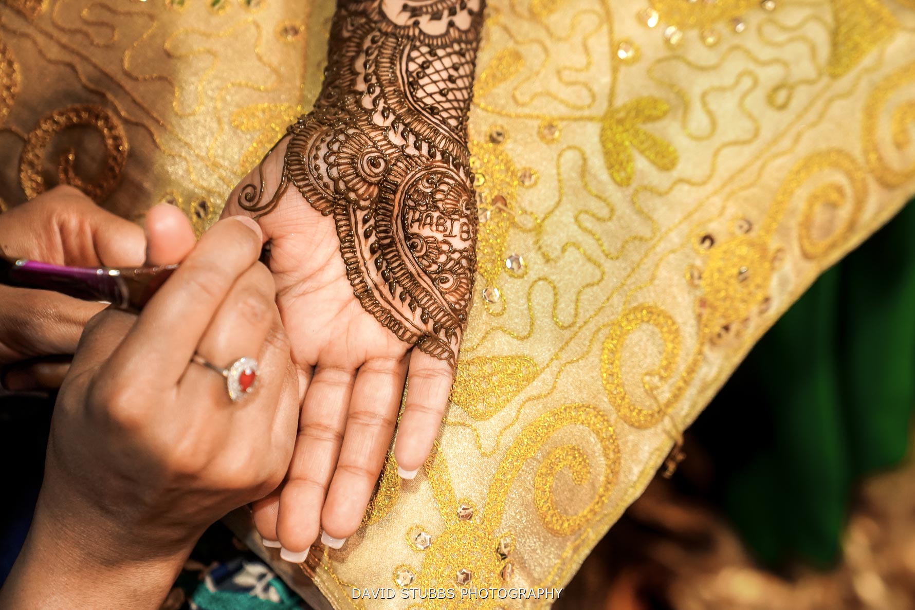 close up of the mendi on hr hands
